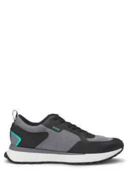 Mixed-material trainers with mesh details and branding